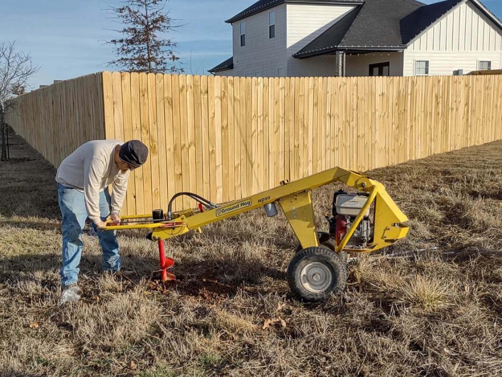 Residential backyard fence post installation in Abilene TX
