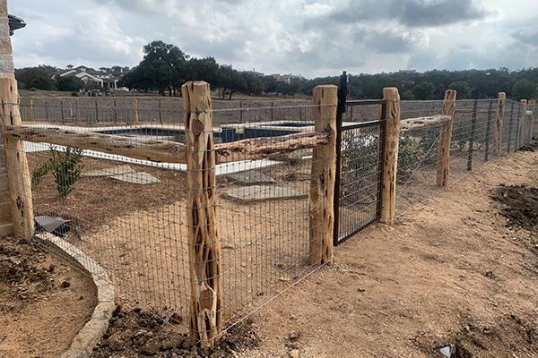 Livestock fence post installation in Abilene Texas