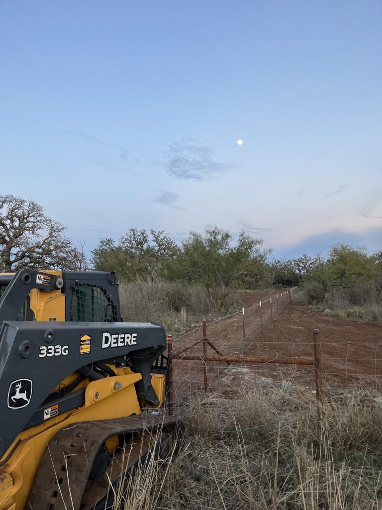 Livestock fence drilling with skid steer auger in Abilene TX