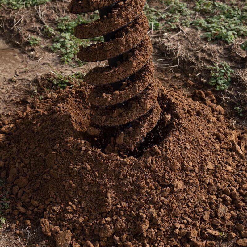 Privacy fence post holes dug with earth auger in Abilene Texas