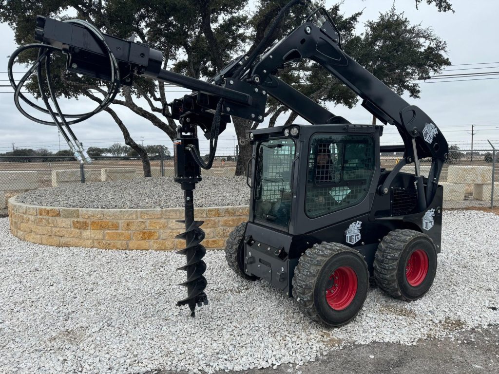 Skid steer auger drilling rocky ground in Abilene Texas