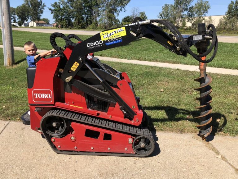 Fence line drilling with skid steer auger in Abilene TX