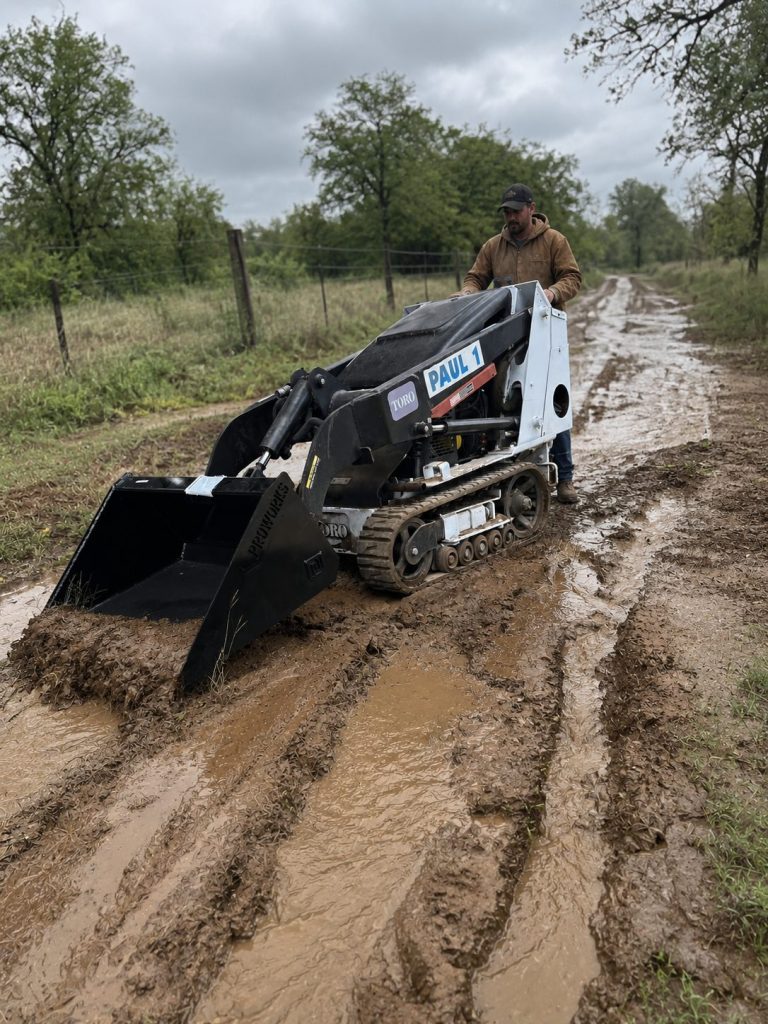 Water runoff control and drainage correction on a ranch road in West Texas
